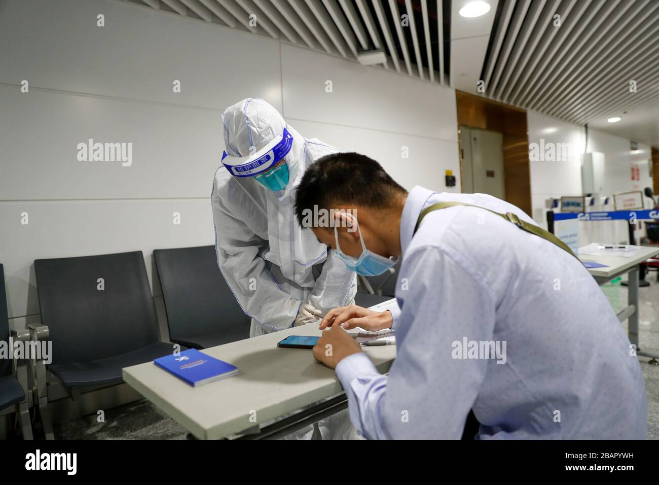 Chongqing China 29th Mar 2020 A Staff Member Of The Customs Helps A Chongqing China 29th Mar 2020 A Staff Member Of The Customs Helps A